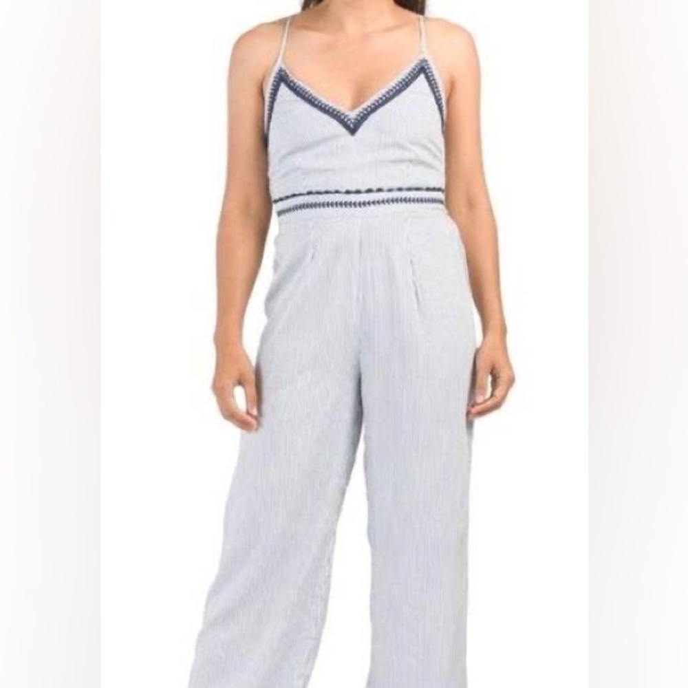 Blue and White Striped Jumpsuit With Floral Detail